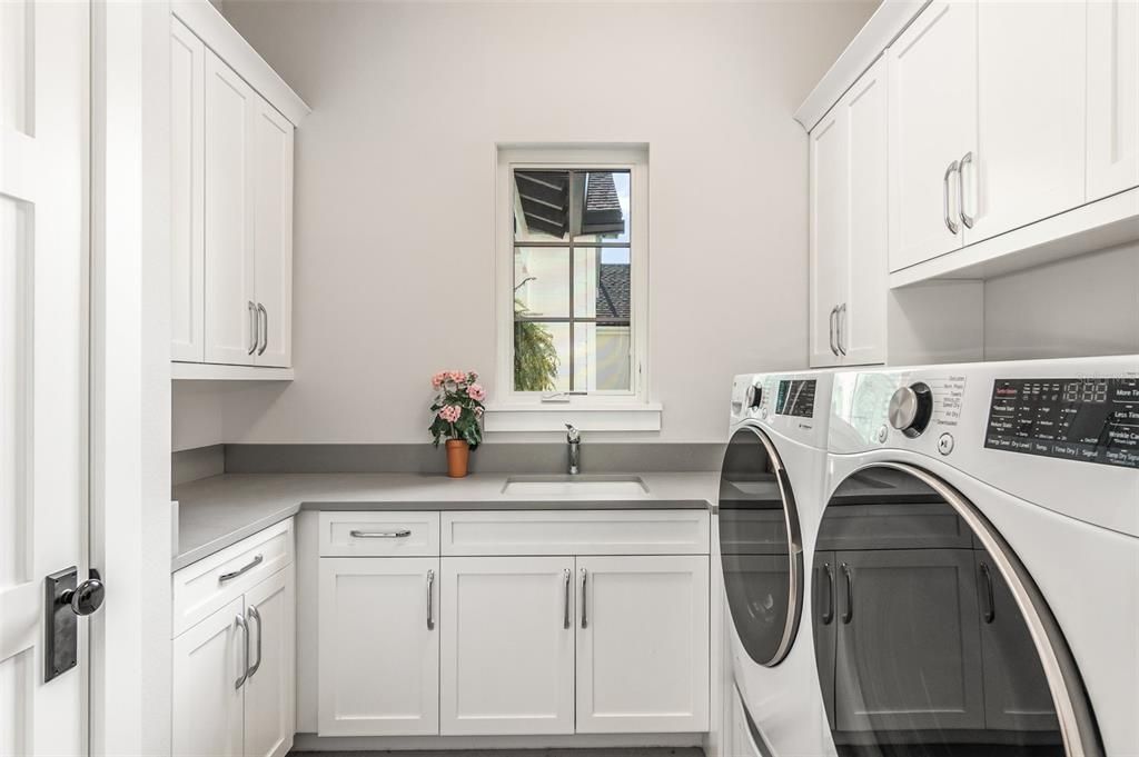 1st floor laundry room with tons of storage