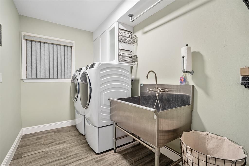 Laundry room with large sink
