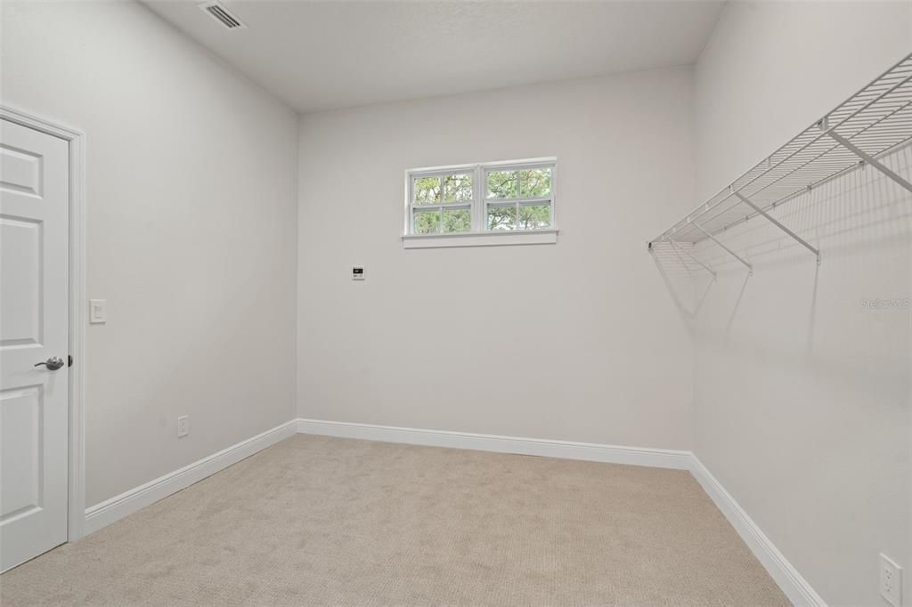 Expansive primary walk-in closet