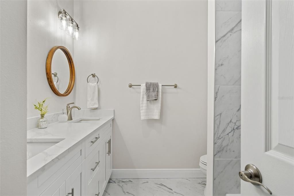 Guest bathroom with double sink vanity