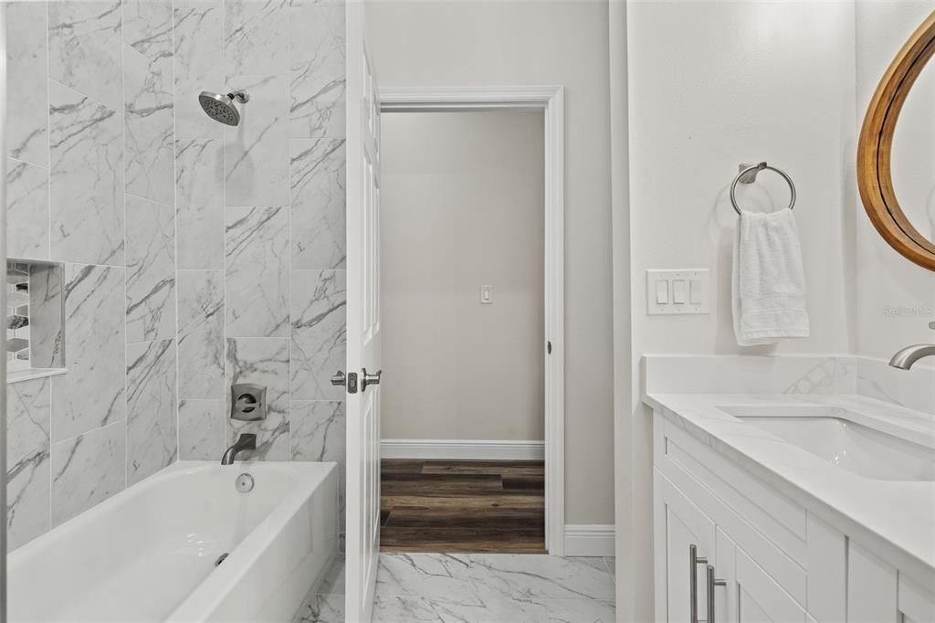 Guest bathroom with shower/tub combo