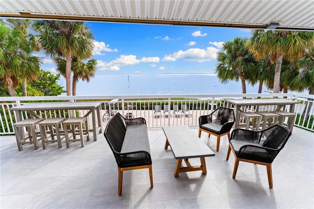 Large deck over-looking pool and Bay.