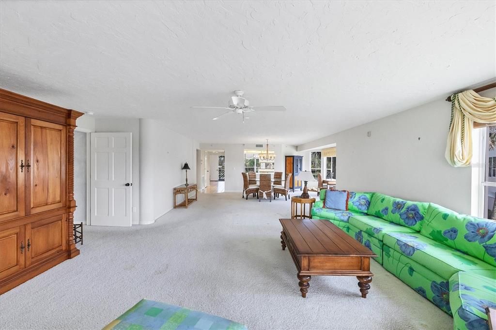 Foyer entry flows into the Living & Dining Rooms