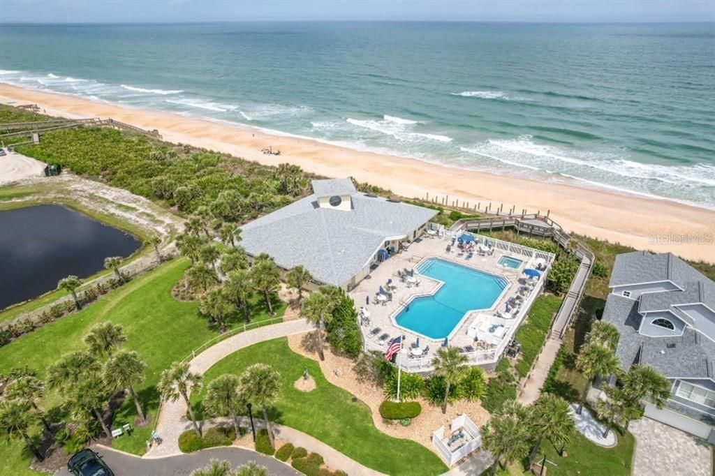 Ariel view of pool/ clubhouse & beach