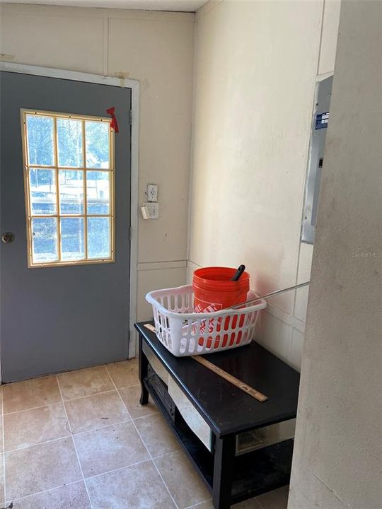 Laundry room and side entrance