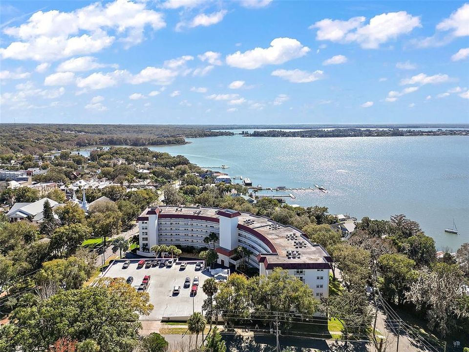 Iconic Villa Dora condo complex overlooking the shores of Lake Dora and steps from downtown