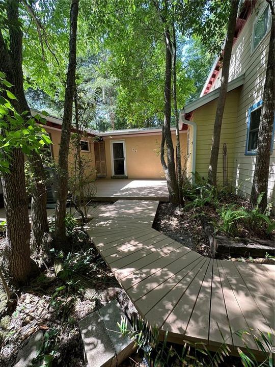 Brand new deck that connects the main house, garage, and in-law.