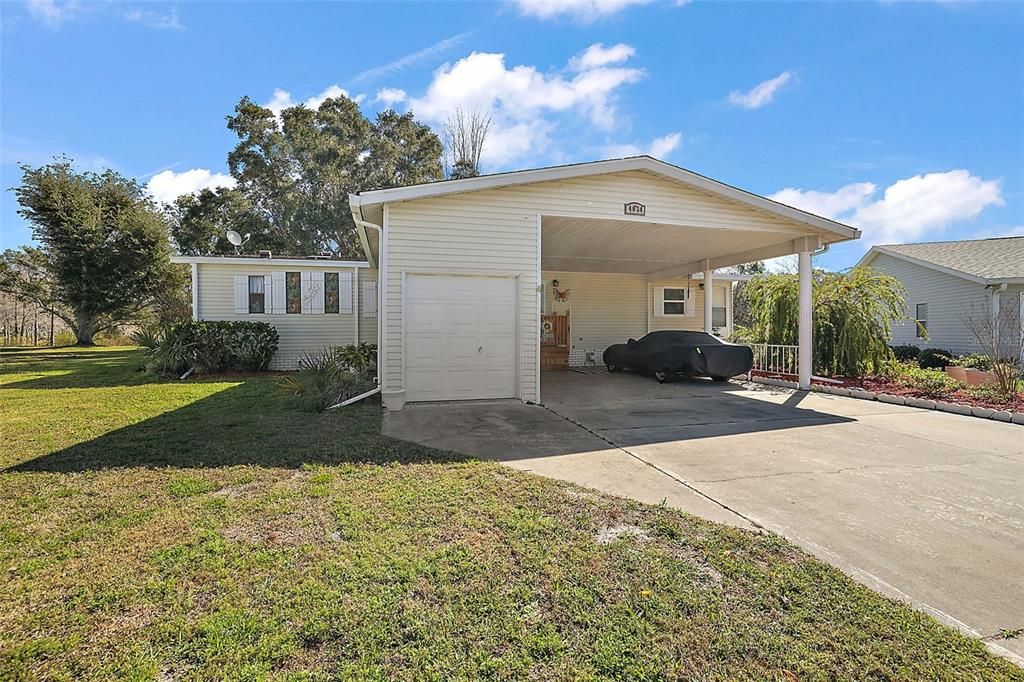 Spacious driveway and carport