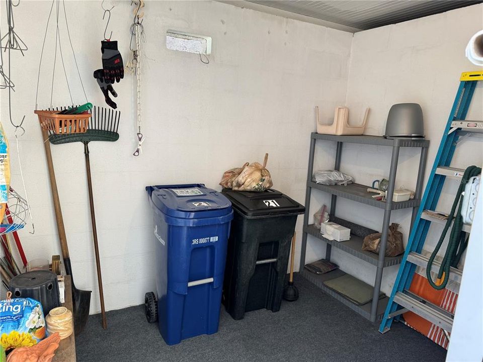 Storage/Workshop area is located behind the carport separate from the villa