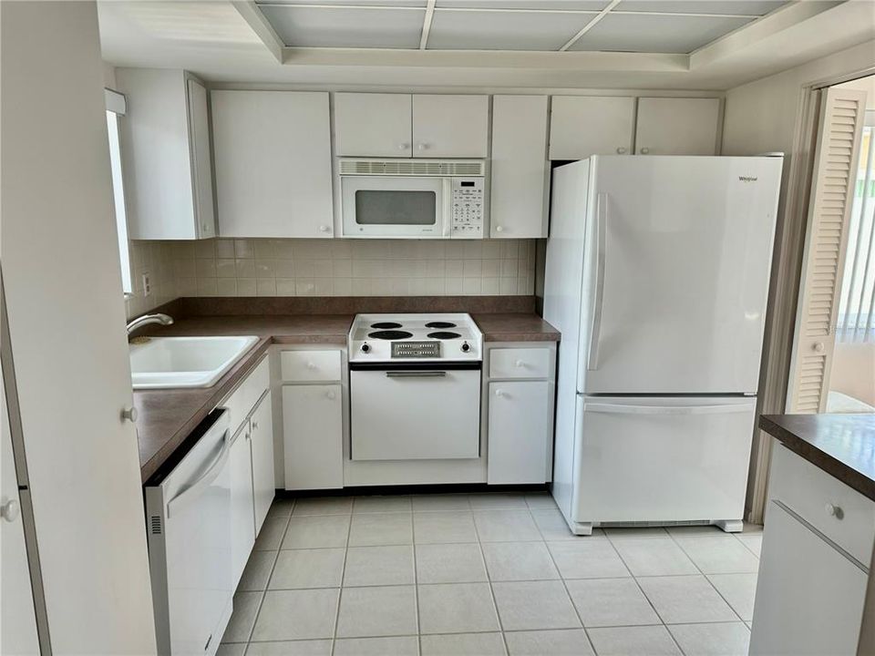 Kitchen has plenty of storage cabinets