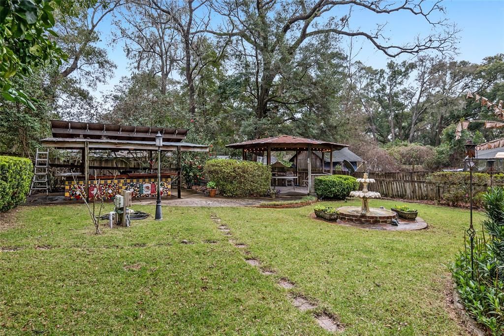 rustic kitchen with gazebo party space