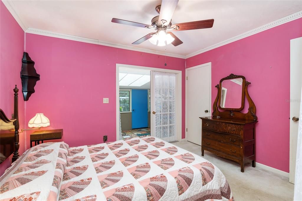 master bedroom with view of sunroom