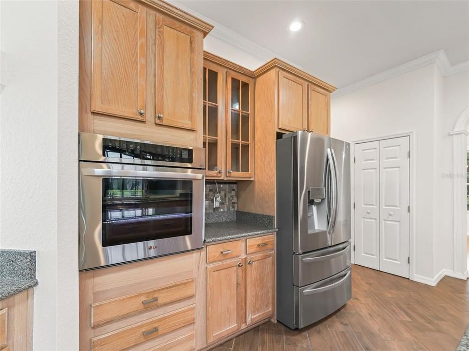 Kitchen w/built in oven & pull outs in pantry