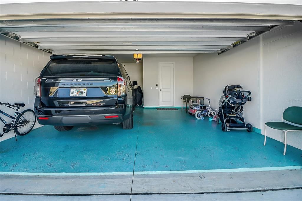Garage is extended on one side to hold oversized Vehicle! The floor is Epoxy for easy maintenance.