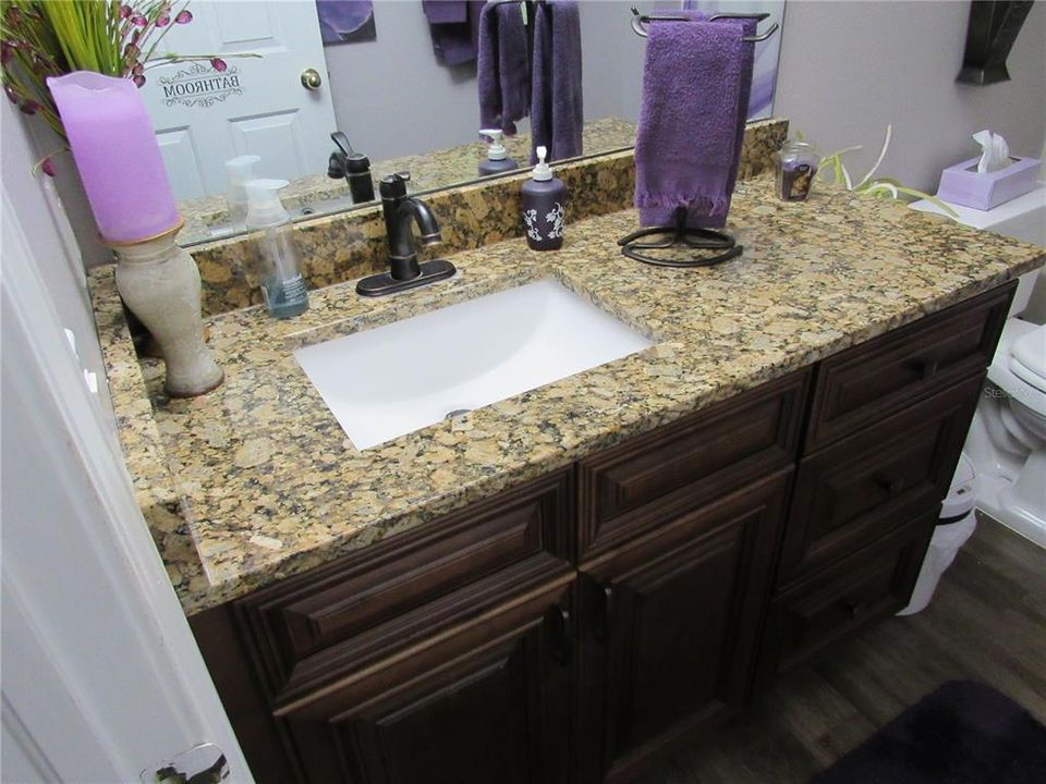 Second full bathroom with beautiful granite couinter top
