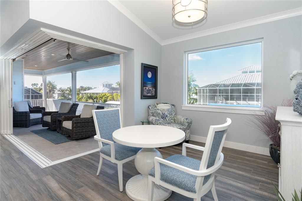 Breakfast Nook and zero degree sliders allow the outdoors to flow indoors