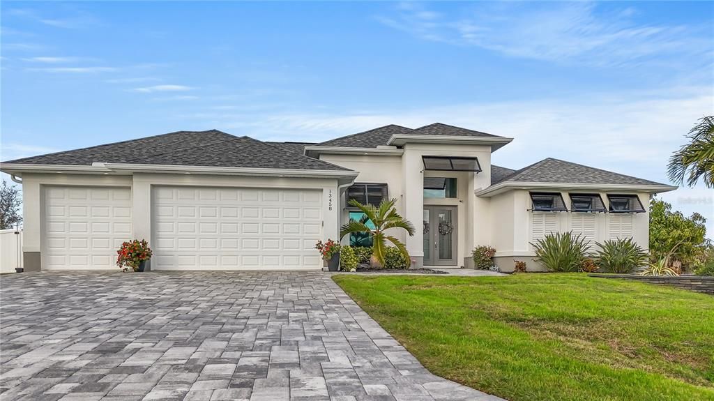 THIS HOME IS LOCATED THE WATER FRONT COMMUNITY OF SOUTH GULF COVE