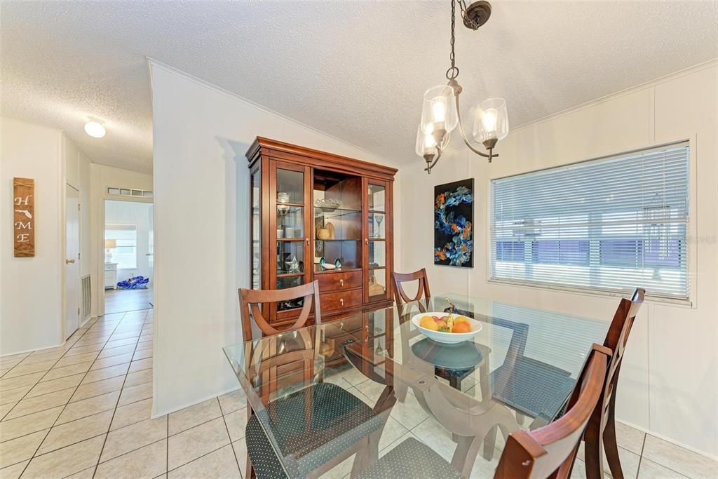 Dining Area off Kitchen and View down Bedroom Hallway.