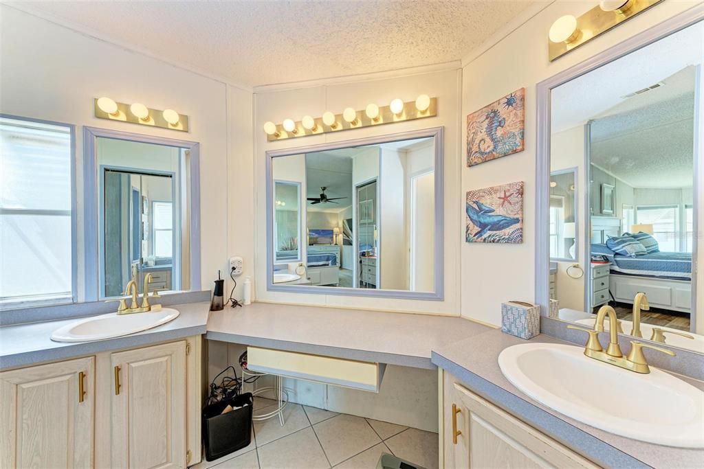 Owner's Bath has Separate Double Vanities and Make-up Area!