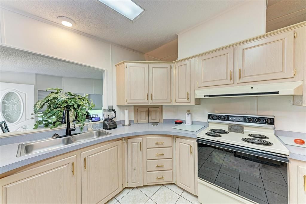 Volume Ceilings in Kitchen with Cabinets Galore!