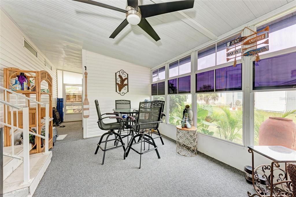 Outdoor Living Area, Nice Landscaping, and Back Wall is the Storage/Shop Area!