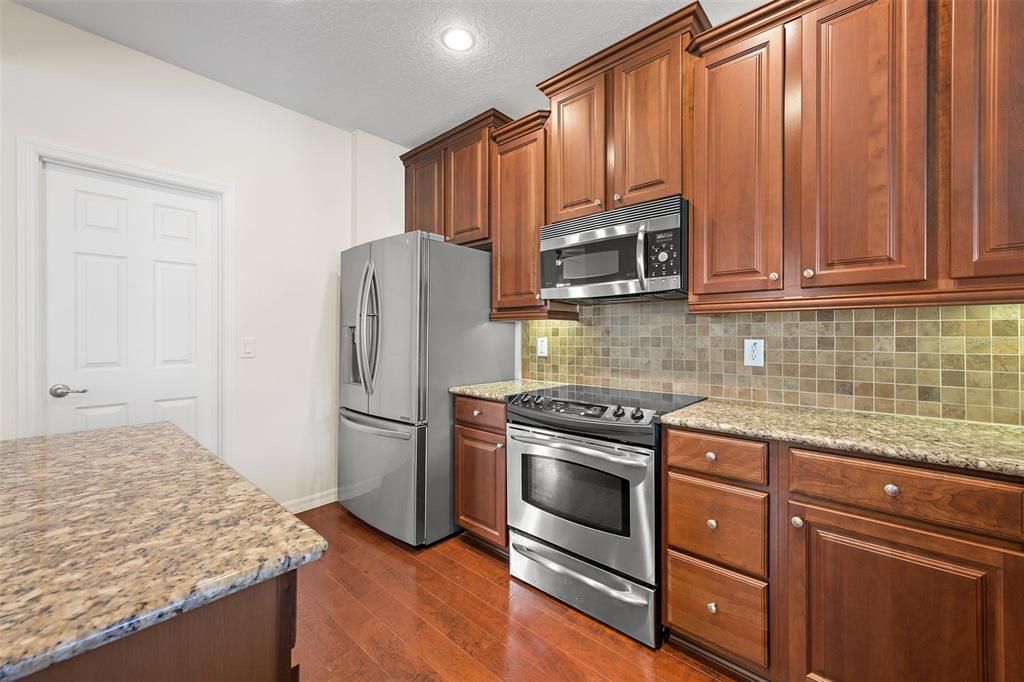 Stainless steel appliances and walk in pantry