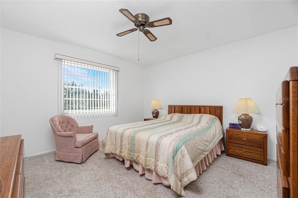 The spacious master bedroom can accommodate a king sized bed.