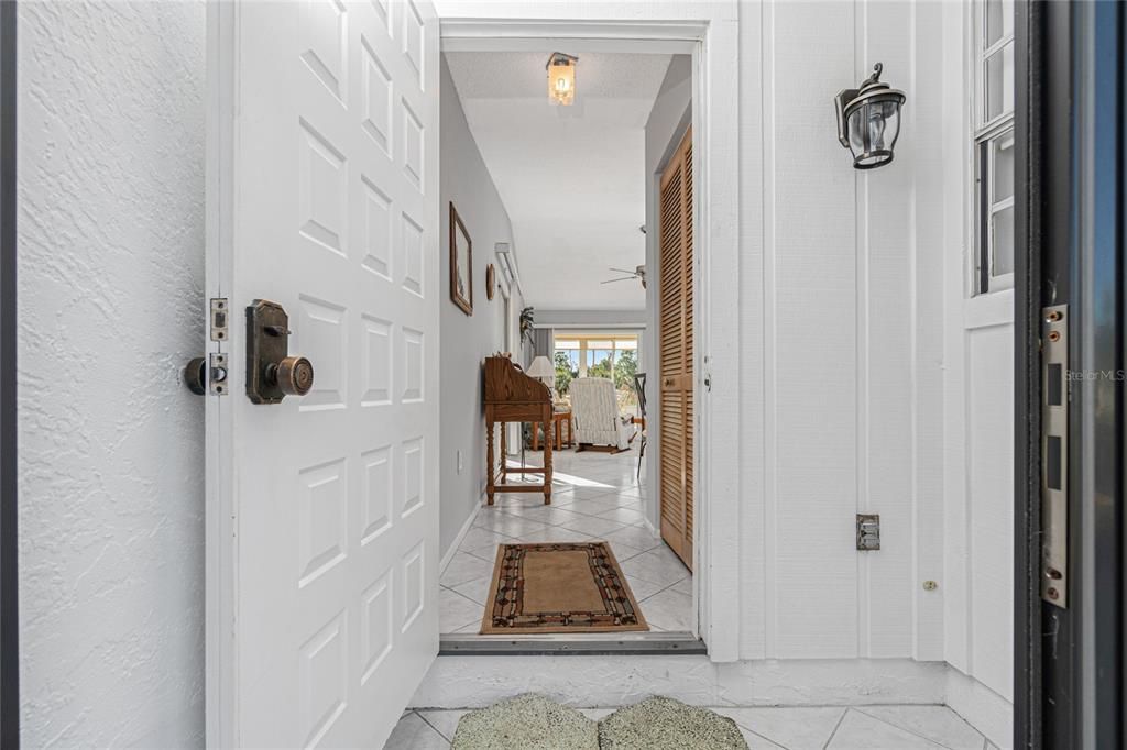 The raised panel front door adds character to the home.
