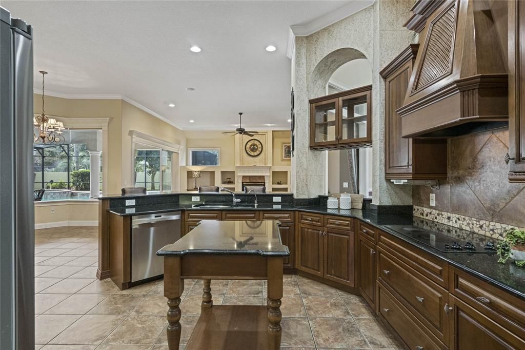 Center Island is adorned with Granite Countertops