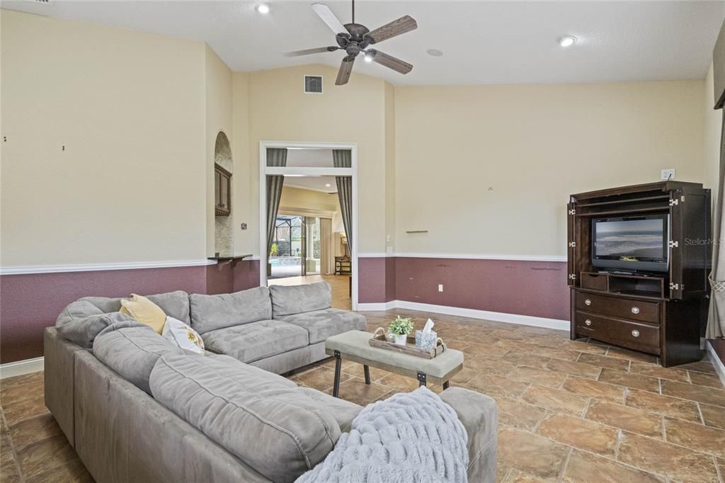 Game Room features Vaulted Ceilings and Chair Rail Molding