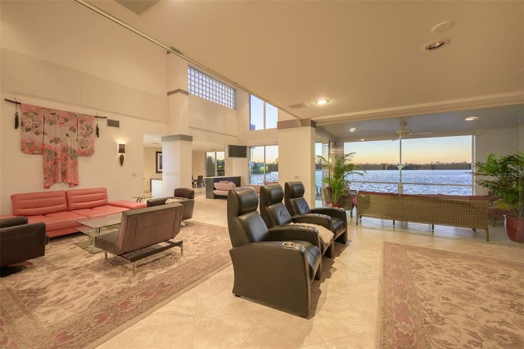 Great Room looking toward Media Room with Surround System & Hidden Blackout Curtains