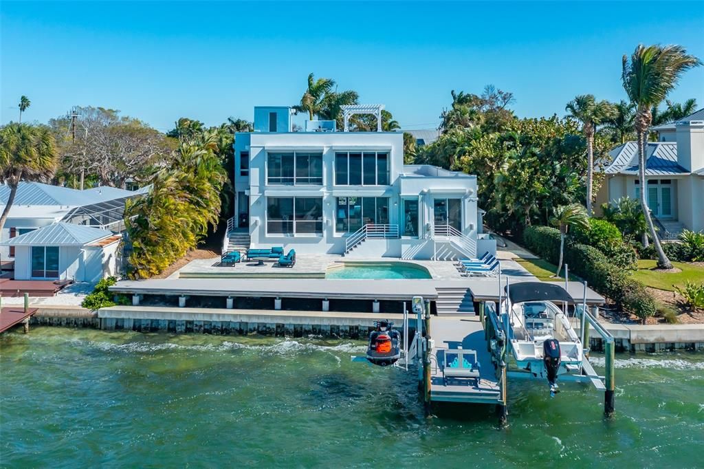 Back of Home View with New Seawall, Dock and 2 Lifts