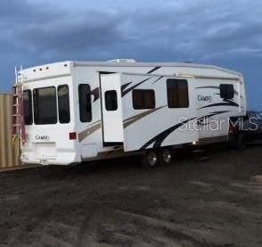 RV Conveys with sale of home!