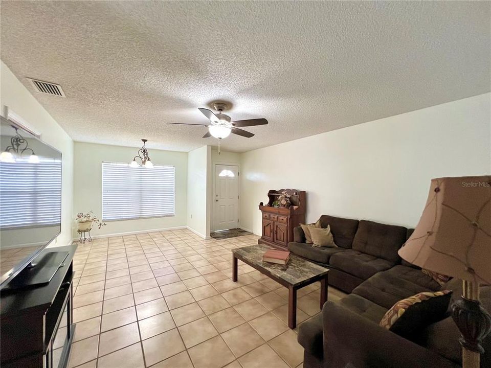 open floor plan w/ living & dining areas