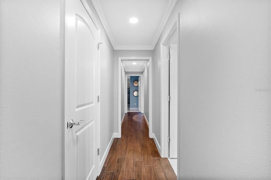 Hallway to Office/Gym and secondary bedrooms