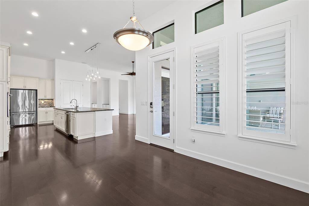 Dining Room w/Door to Lanai & Pool