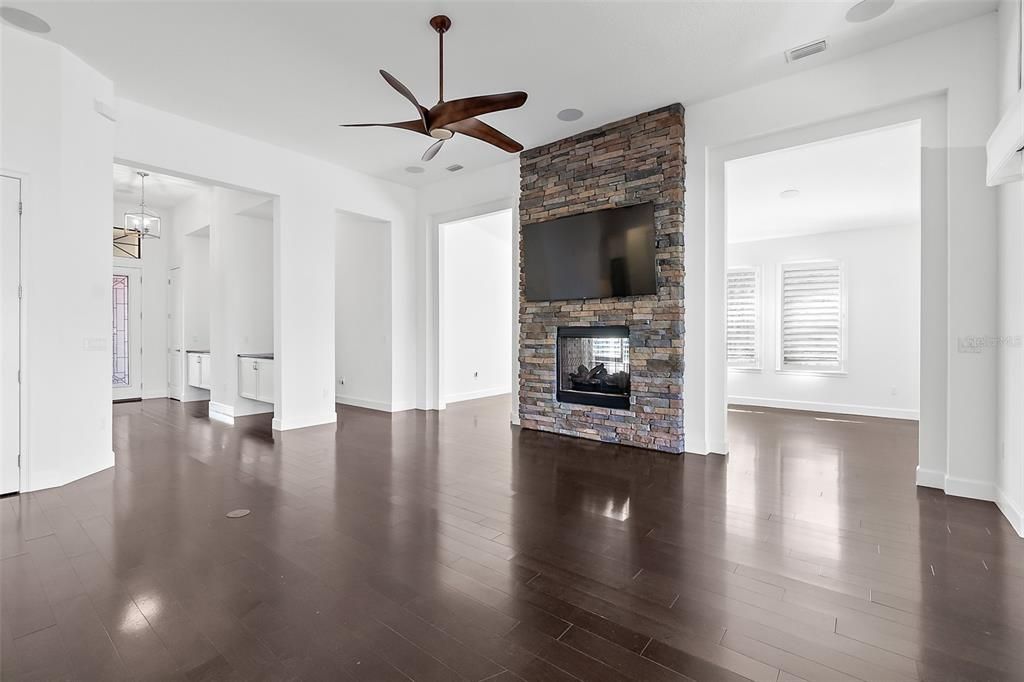 Double-sided Gas Fireplace on Stone Wall