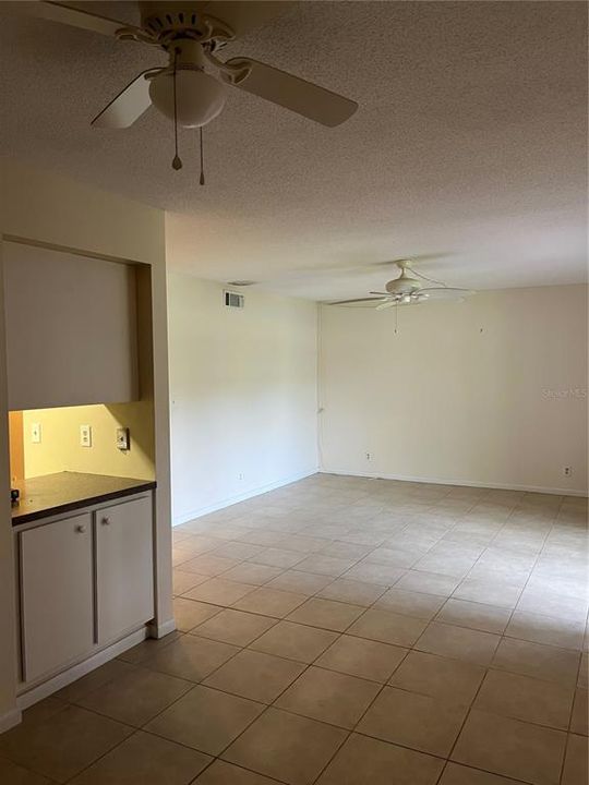 Living Room/ Dining room combo features a breakfast bar