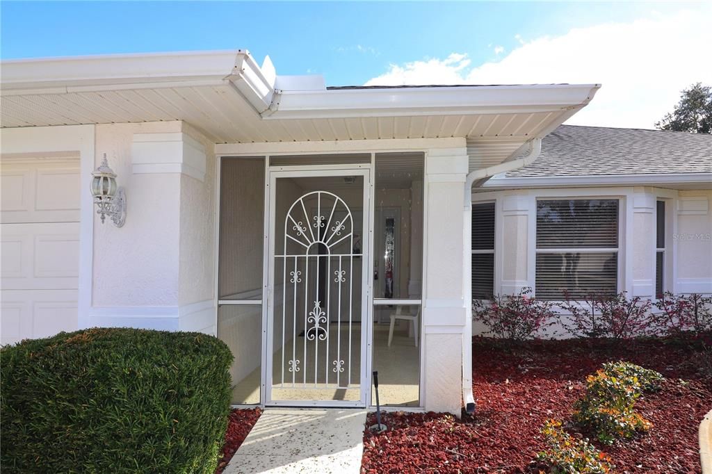 covered, screened front entry