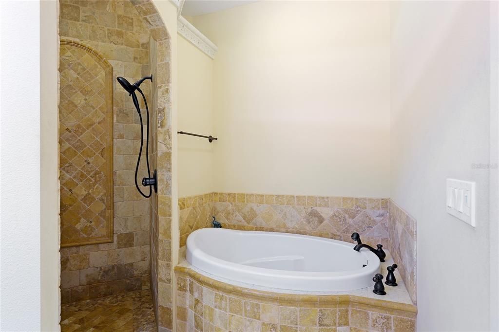 Custom soaking tub built in to surround of custom tile