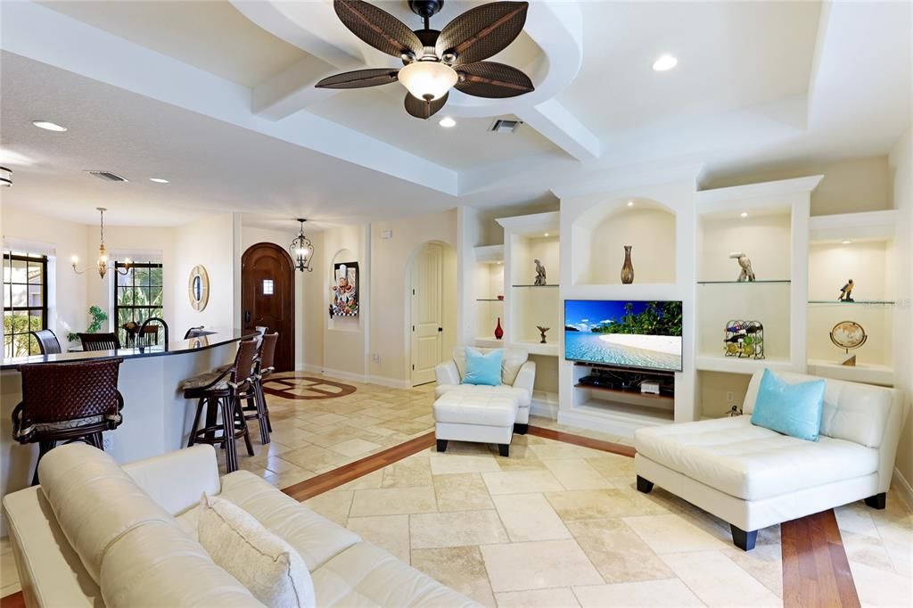 Great Room with open concept, off the Primary Bedroom and overlooking the lanai, Salt Water Pool and Spa.