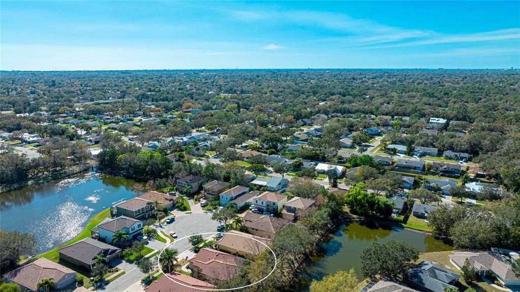 Street view of homes which both sides face water views.