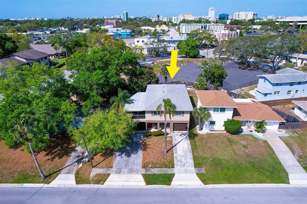 Aerial showing long driveway to garage for Unit 1, long driveway and single carport for Unit 3 and adjacent left  side of double driveway provides tandem 2 car parking spaces for Unit 2