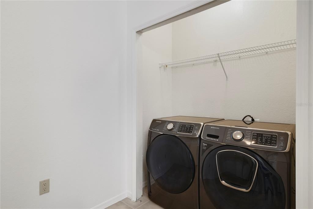 Laundry closet off master bath for quick, easy laundry so you and your laundry can be done simultaneously. No dragging laundry to a laundry mat when you have the perfect appliances right in your new home.