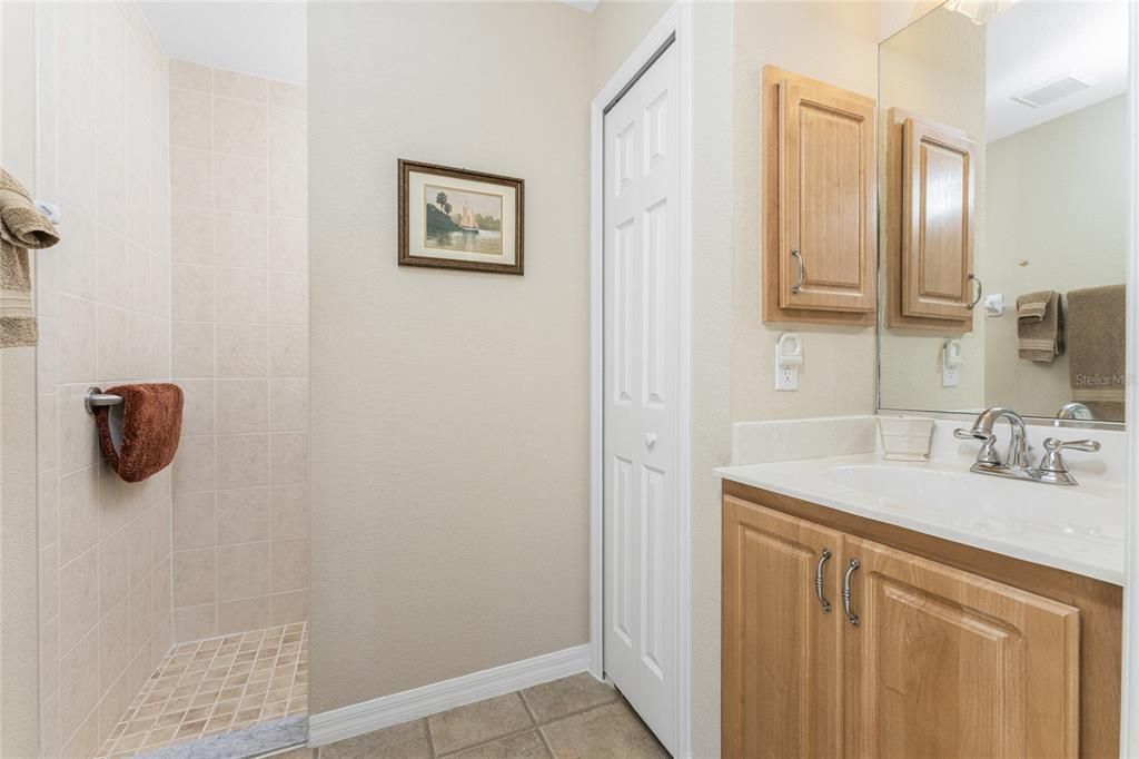 The second master bathroom (Bathroom #3) has a linen closet and  walk in shower.