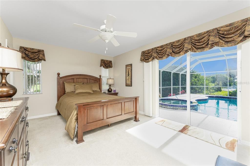 Enjoy direct access from the second master suite (Bedroom #4)  to the pool area through pocket sliding glass doors.