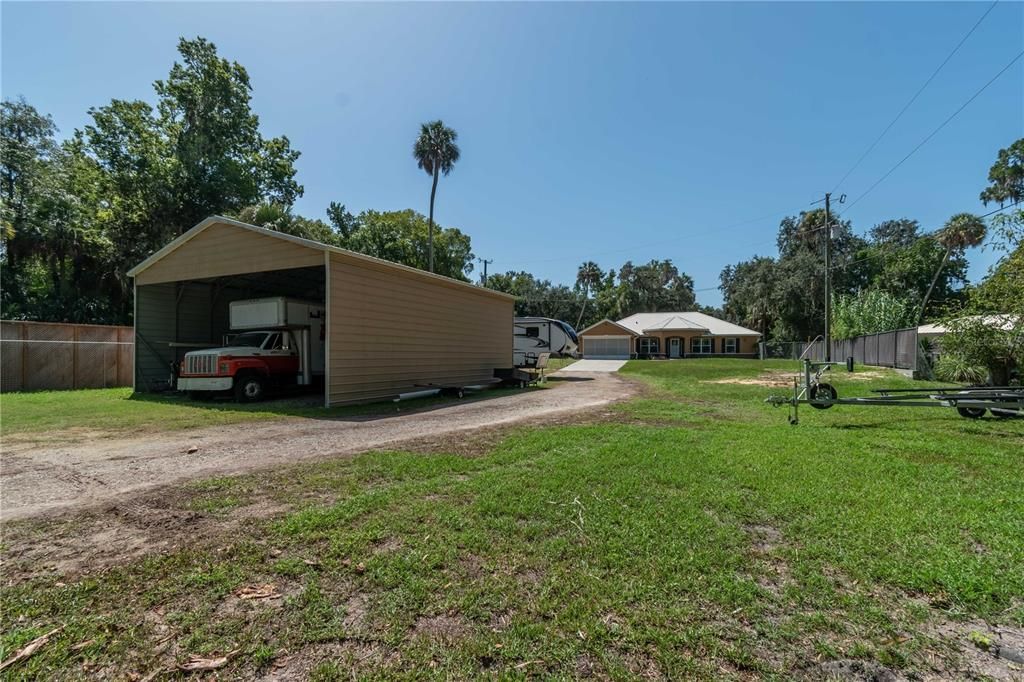 Covered carport for your rv, boat or toys.