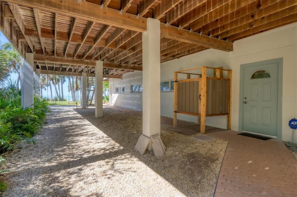 Entry door to ground level & outdoor shower