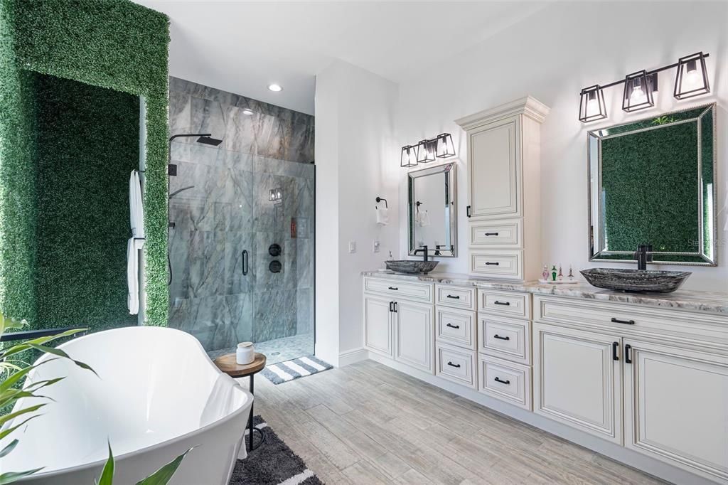 Master Bathroom with Freestanding Soaking Tub and Duo Shower Heads
