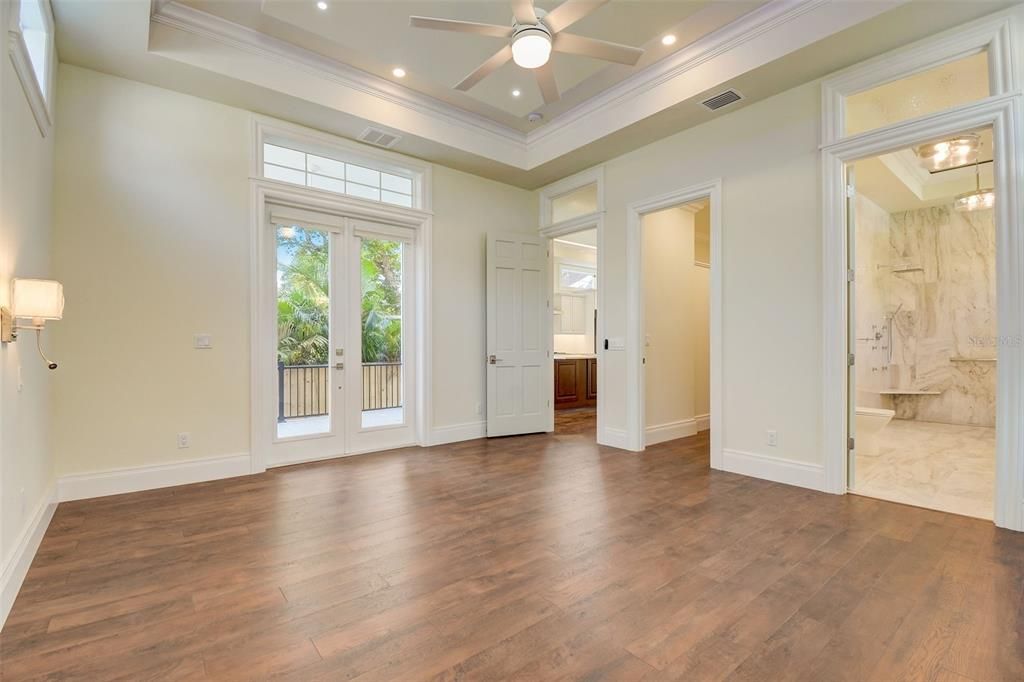 Master Bedroom with has French Doors opening to Back Patio